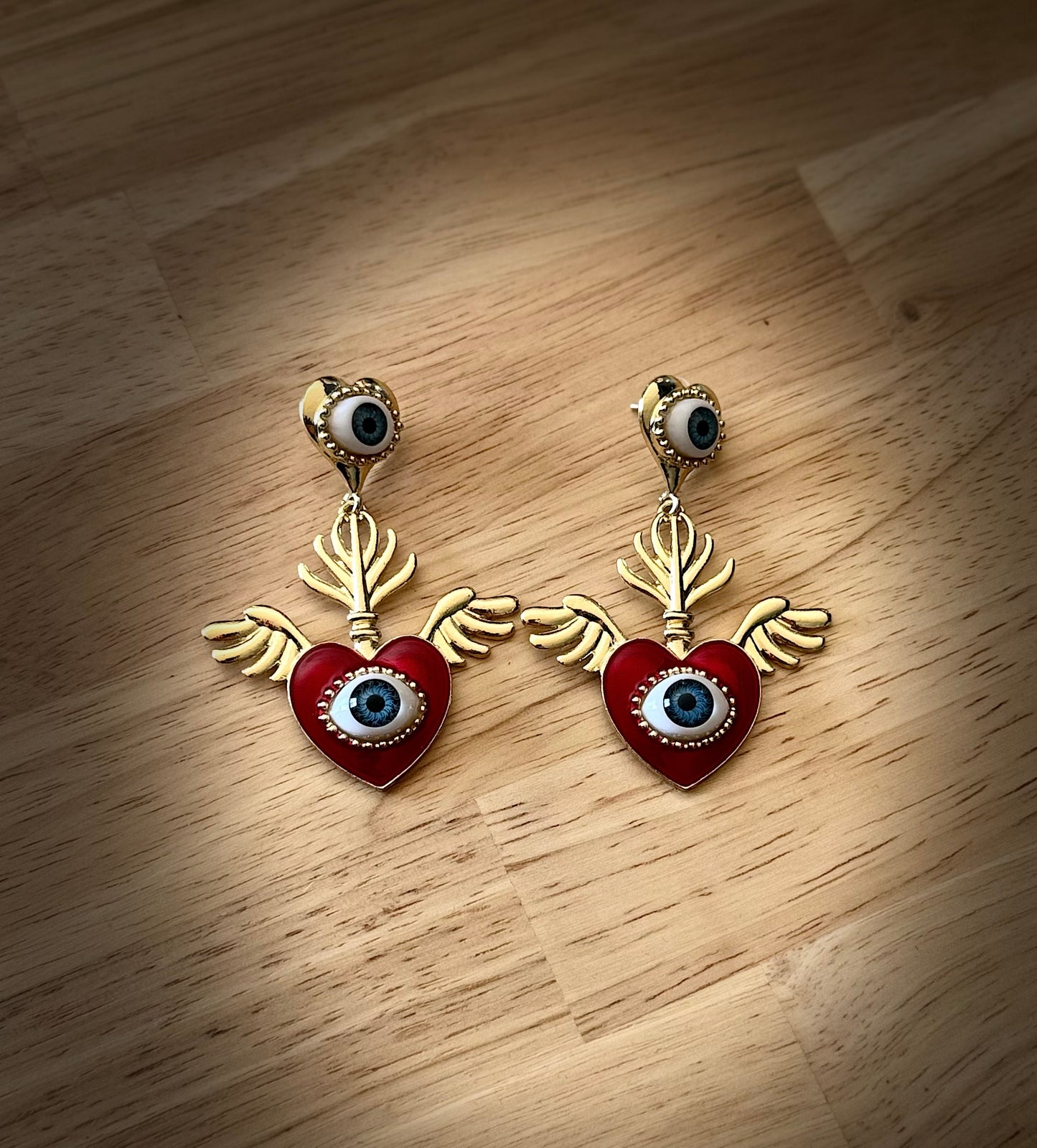 EYEWING HEART EARRINGS