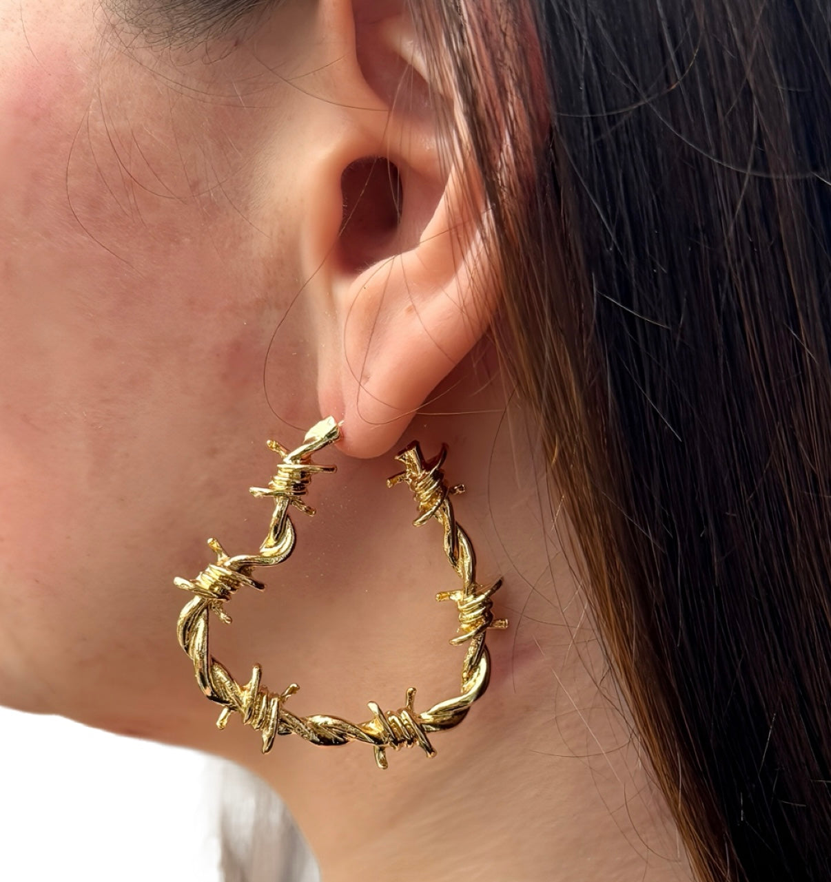RAZOR SHARP HEART EARRINGS